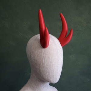 May include: A set of three ceramic nesting bowls in shades of blue, green, and white. The bowls have a speckled glaze and a simple, modern design. The largest bowl is approximately 15 cm in diameter.