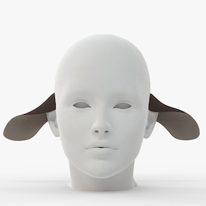May include: A white mannequin head with brown fabric ear covers. The ear covers are attached to the head and extend out to the sides.