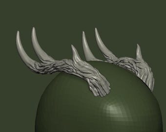 May include: A green helmet with a set of sculpted antlers attached to the top. The antlers are made of a light gray material and have a textured surface.