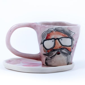 Cute ceramic espresso cup with saucer