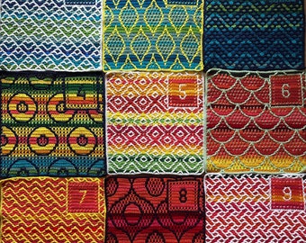 May include: Twelve colorful crochet squares with numbers 1 through 12 in the center of each square. The squares are arranged in four rows of three squares each. The squares are made with different crochet stitches and patterns.