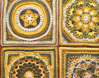 May include: Four square crochet motifs featuring intricate geometric and floral patterns in shades of yellow, olive green, and white. Each piece displays complex stitch work, including star and mandala designs, with textured borders and layers.
