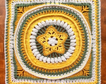 May include: A square crochet motif featuring a central yellow star with a white flower center. The design incorporates concentric circular patterns in yellow, white, and dark green yarn, transitioning into a square border with intricate stitch details.