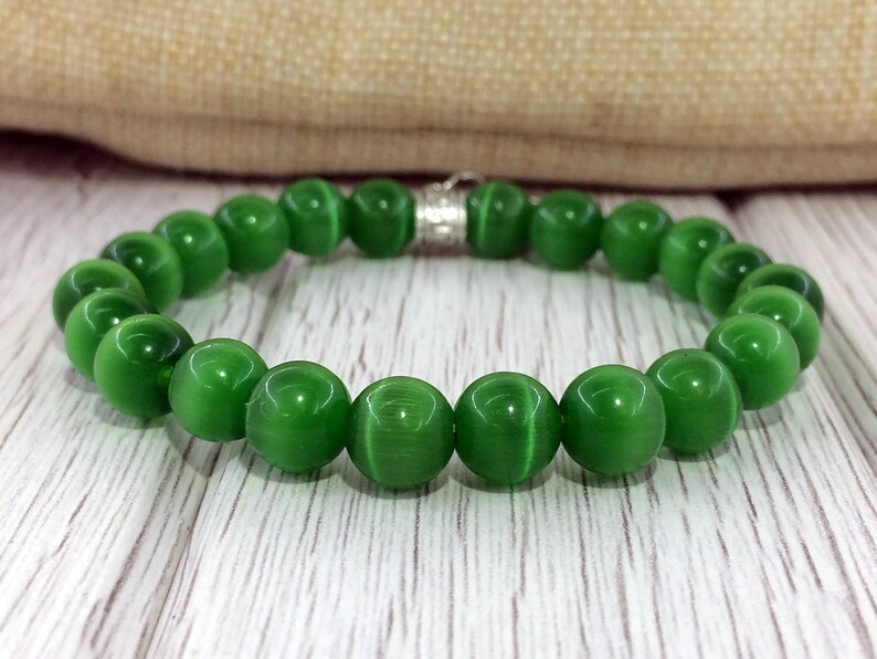 Cat eye bracelet Elephant Protection gemstone Green chakra Spiritual bracelet Evil eye bracelet Green cat eye Gemstone amulet Charm bracelet