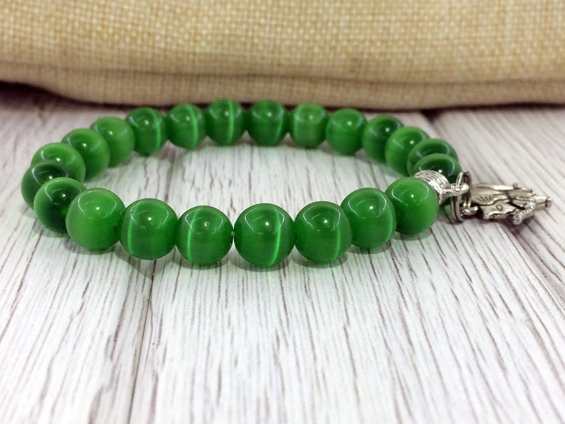 Cat eye bracelet Elephant Protection gemstone Green chakra Spiritual bracelet Evil eye bracelet Green cat eye Gemstone amulet Charm bracelet