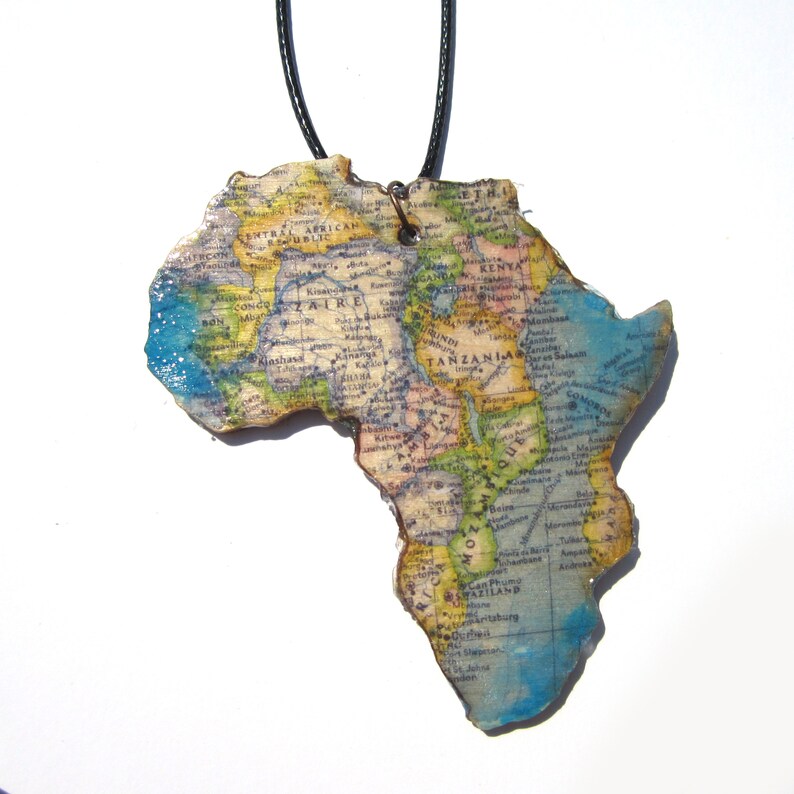 Lasercutted wooden world map necklace. image 5