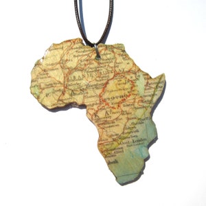 Lasercutted wooden world map necklace. image 6