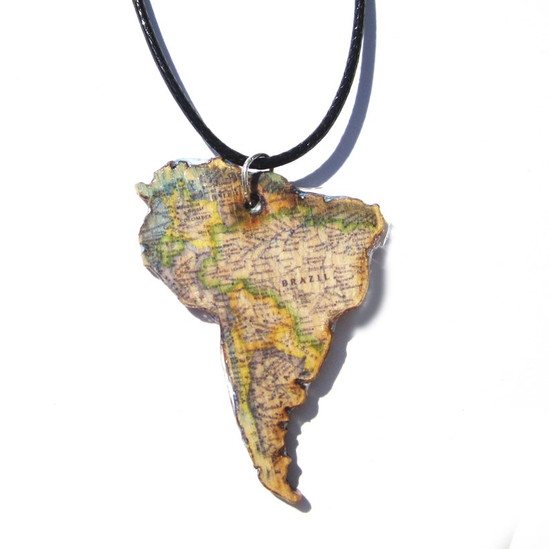 Lasercutted wooden world map necklace. image 4