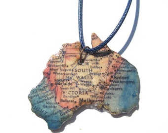 Lasercutted wooden world map necklace.