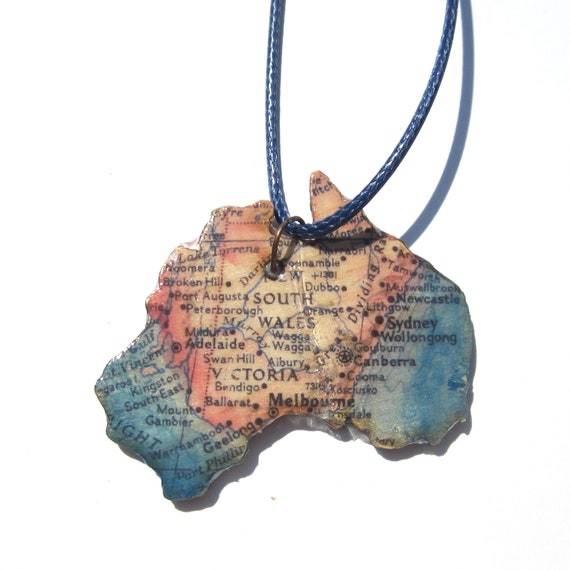 Lasercutted wooden world map necklace.