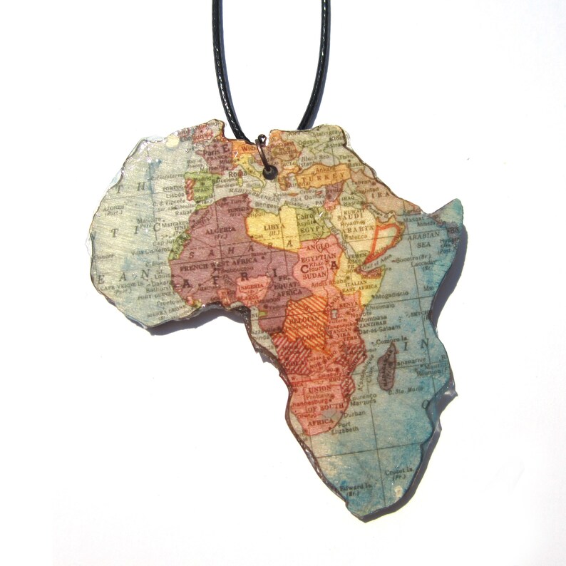 Lasercutted wooden world map necklace. image 8