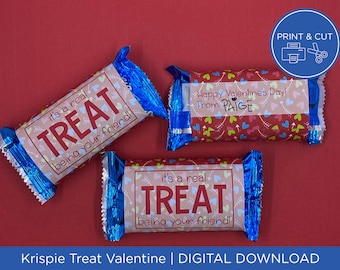 May include: Three wrapped Krispie Treat Valentines with blue foil wrappers. The treats have labels with text that reads "it's a real TREAT being your friend!" and "Happy Valentine's Day! From PAIGE."