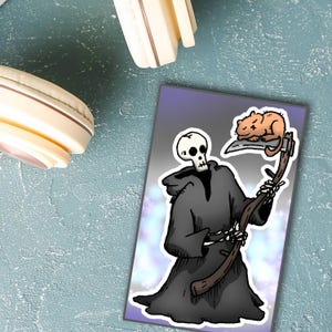 May include: A sticker featuring a cartoon Grim Reaper with a scythe, holding a sleeping orange cat. The Reaper is in a black hooded cloak, with a white skull face. The background is a gradient of purple and white.