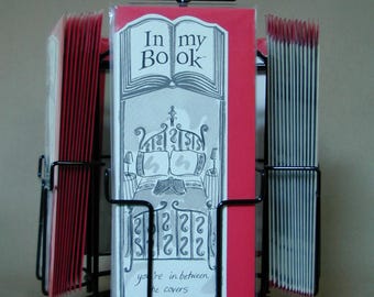 BETWEEN THE COVERS greeting card bookmark