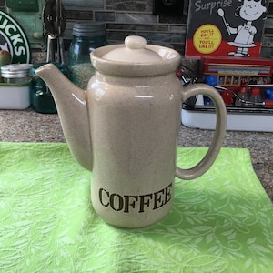 Keramische koffiekaraf