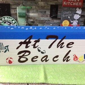At the Beach Wood Sign