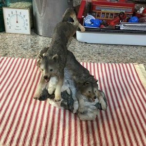 Jumping Wolves Figurine