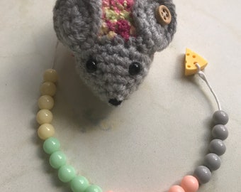 Crocheted calculating mouse