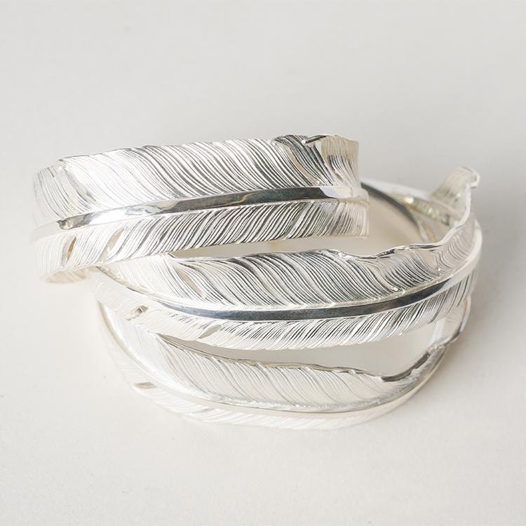orné de feuilles plumes et volutes idée cadeau Bijoux Bracelets Bracelets manchette fait main. pièce unique en argent 925/1000 Bracelet amérindien mixte 