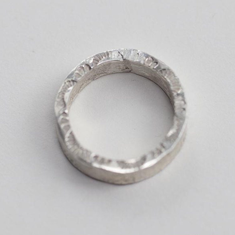 Upcycled rings made with soft solder on pure silver hammered bands