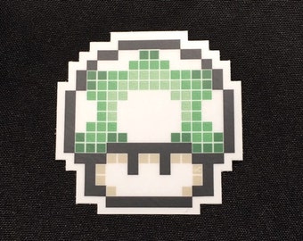 1-Up shroom pixel-Art sticker / vinyl Decal貼, green Super Mario mushroom w/ 1up texture (cell phone, laptop, or car decal)