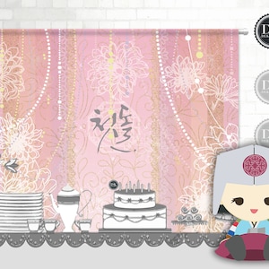 May include: A pink and gold backdrop with white floral designs and a white cake with candles. The backdrop has the word "祝福" written in black. A cartoon character wearing a traditional Korean hat and clothing is sitting in front of the cake.