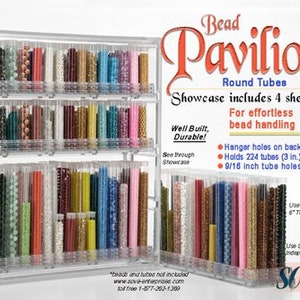 May include: A clear plastic bead storage organizer with four shelves. The organizer holds 224 bead tubes (3 inches) and has 9/16 inch tube holes. The organizer is labeled "Bead Pavilion Round Tubes".