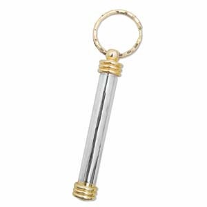 May include: A silver and gold key chain with a cylindrical container. The container has a gold top and bottom with a silver middle.