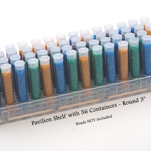 May include: A clear plastic storage shelf with 56 small round containers. The containers are filled with colorful beads. The shelf is labeled "Pavilion Shelf with 56 Containers - Round 3" and "Beads NOT included".