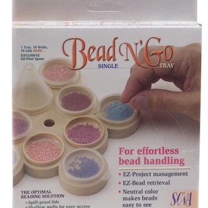 May include: A Bead N' Go single tray in a white box with text. The tray is beige with ten circular wells and lids, containing various colored beads. The box features the text Bead N' Go, For effortless bead handling, and The optimal beading solution.