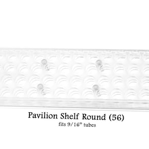 May include: Clear plastic shelf designed to hold 56 round tubes, labeled "Pavilion Shelf Round (56)" and "fits 9/16" tubes".