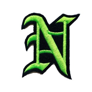 May include: Green embroidered letter N in a black gothic font.