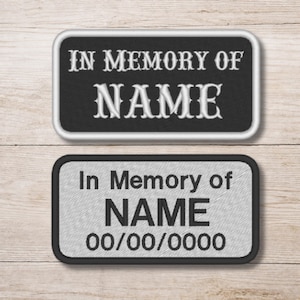 May include: Two rectangular embroidered patches. The top patch is black with white text that reads "IN MEMORY OF NAME". The bottom patch is grey with black text that reads "In Memory of NAME 00/00/0000".