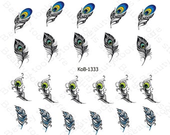 May include: Set of 20 nail decals featuring peacock feathers in black, white, blue, and green. The decals are arranged in rows of four, with each row featuring a different design. The decals are perfect for adding a touch of elegance to your nails.