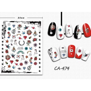 May include: Nail art stickers with a variety of designs, including hearts, anchors, stars, and a woman with a tattoo. The stickers are on a white sheet with a black border. The sheet measures 10.3 cm by 8 cm. The stickers are labeled "CA-474 COLORF".