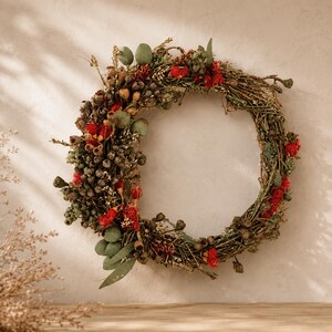 Handmade Australian native dried flower wreath featuring eucalyptus gum nuts, bottlebrush, preserved foliage and rustic twigs