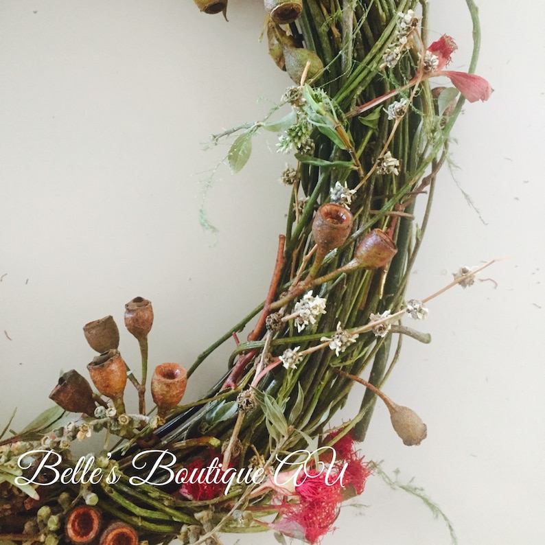 Close up of Fresh Eucalyptus Wreath with Gumnuts and Blossoms