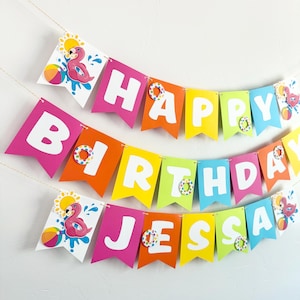 May include: A colorful banner with the words "HAPPY BIRTHDAY JESSA" in large, white letters. Each flag is a different color, with flamingo and beach ball graphics. The banner is strung on a thin, light-colored string.