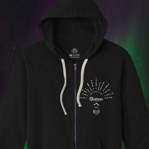 May include: Black zip-up hoodie with a white graphic of a lightbulb with the text "Northstar" and a mountain inside the lightbulb.