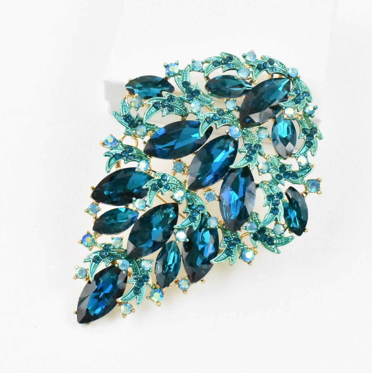 Teal brooch deals