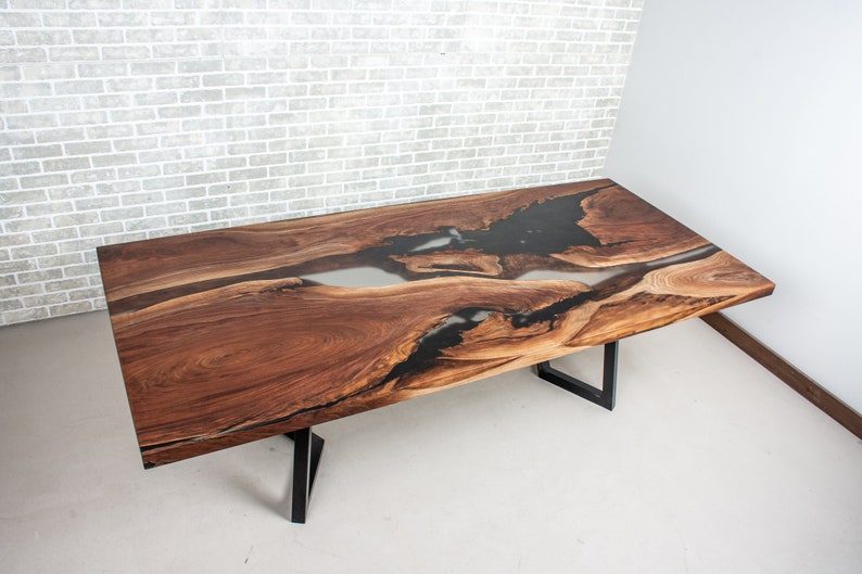 epoxy dining table made with walnut and clear resin