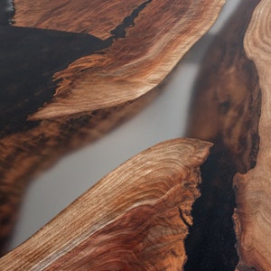 epoxy dining table made with walnut and clear resin