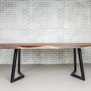 epoxy dining table made with walnut and clear resin