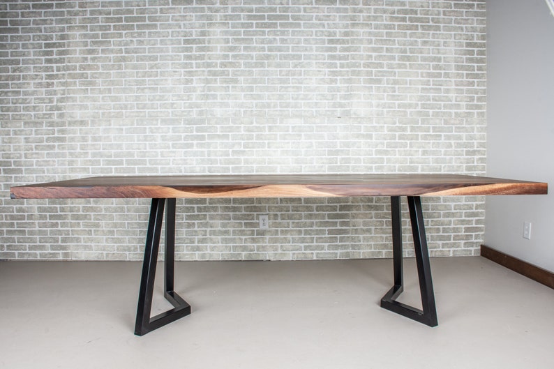 epoxy dining table made with walnut and clear resin