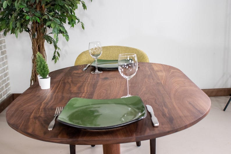 kitchen table made with walnut on pedestal base