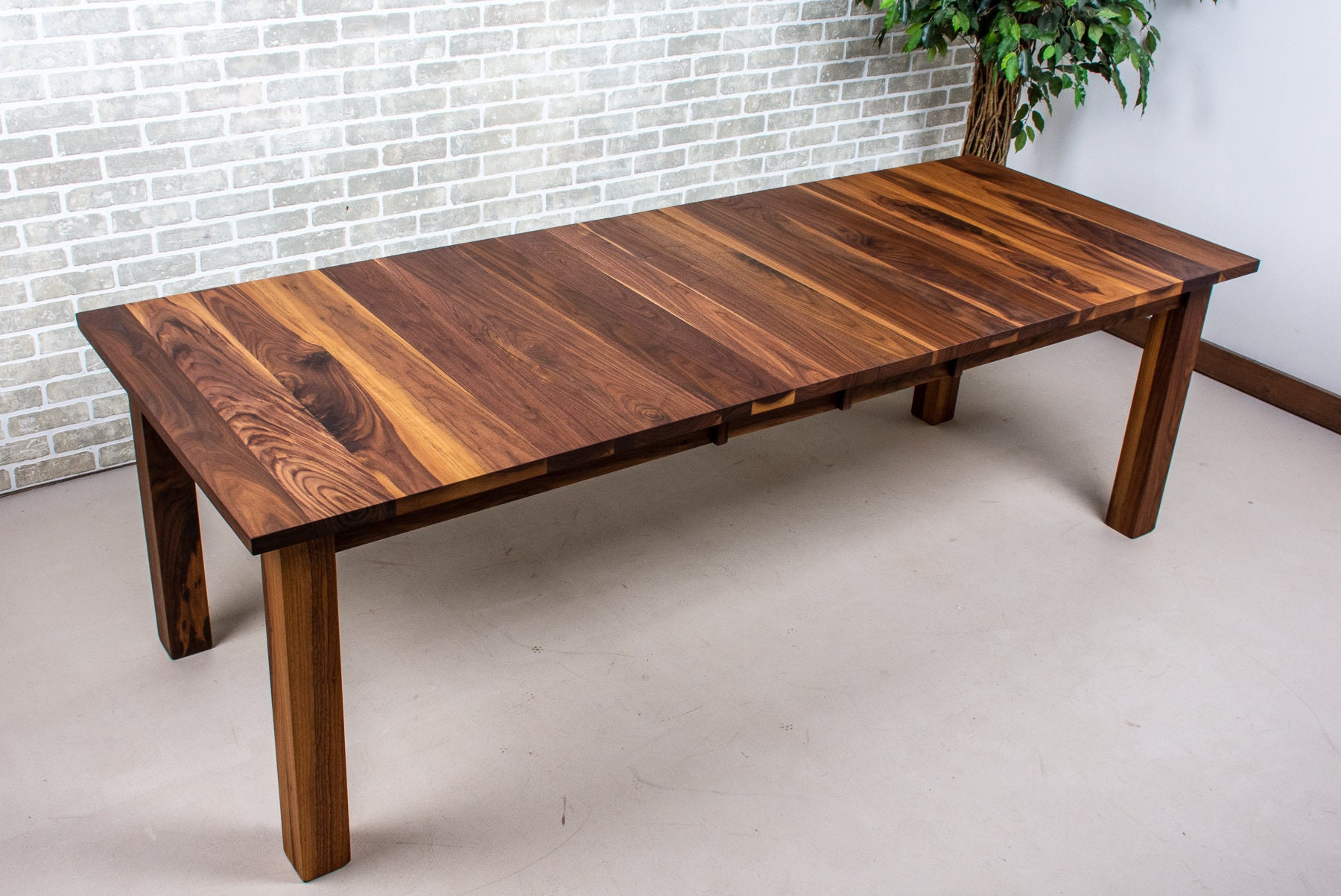 Extendable Black Walnut Dining Table: Modern Solid Wood Design