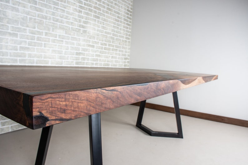 epoxy dining table made with walnut and clear resin
