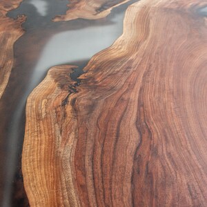 epoxy dining table made with walnut and clear resin