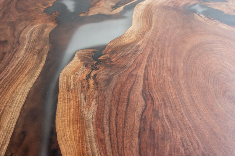 epoxy dining table made with walnut and clear resin