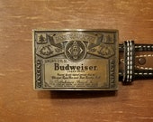 1990 39 s Budweiser solid brass buckle and Justin leather belt - brass, black and brown leather